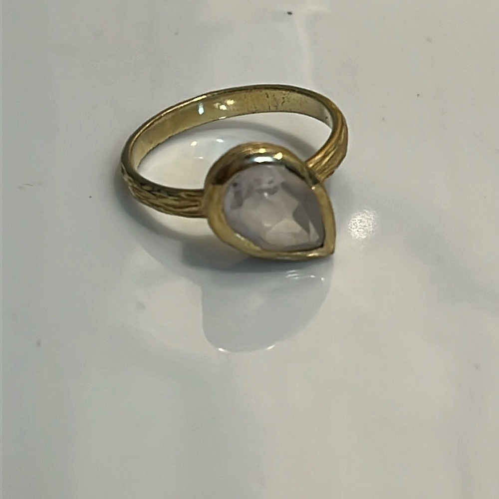 Gold tone Ring size 6.75 with light pink stone